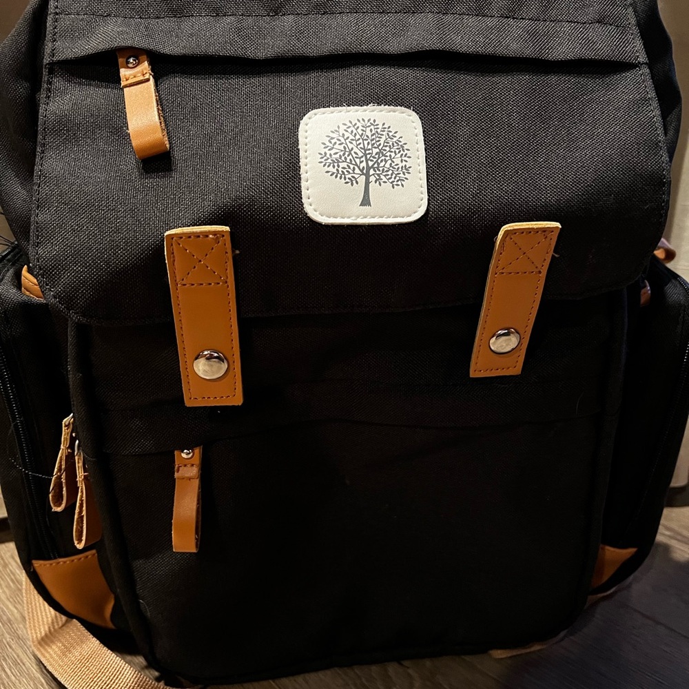 Stylish Black Backpack with Tan Accents